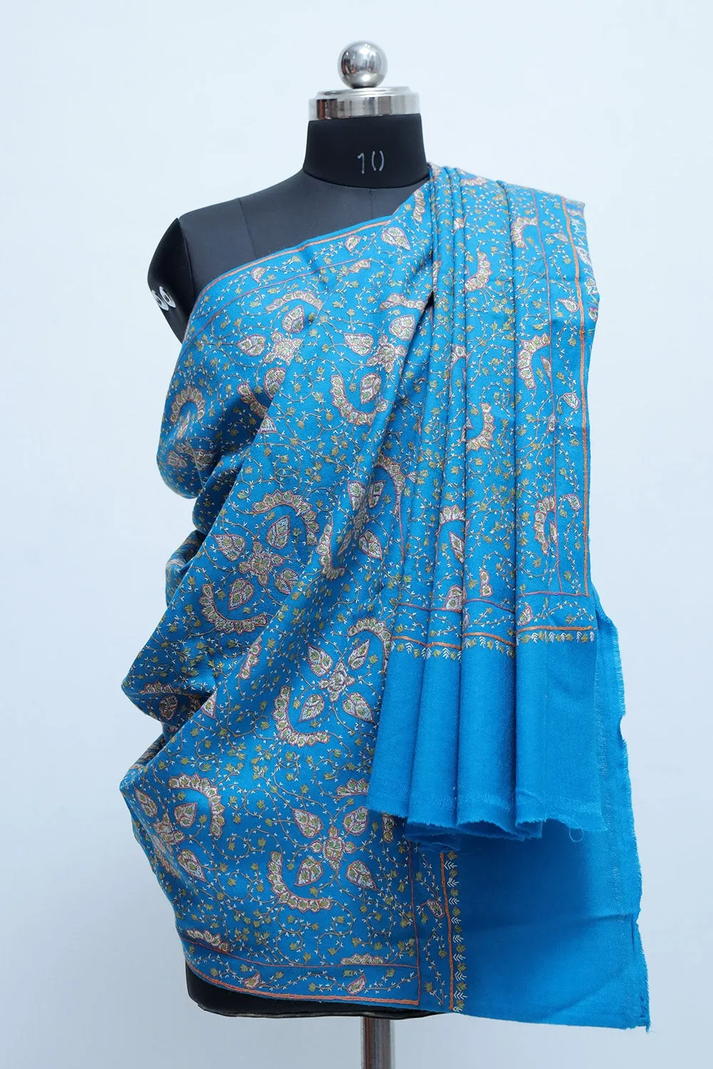 Blue Colour Sozni Shawl With Richly Embroidered Border And Jaal Looks Attractive.